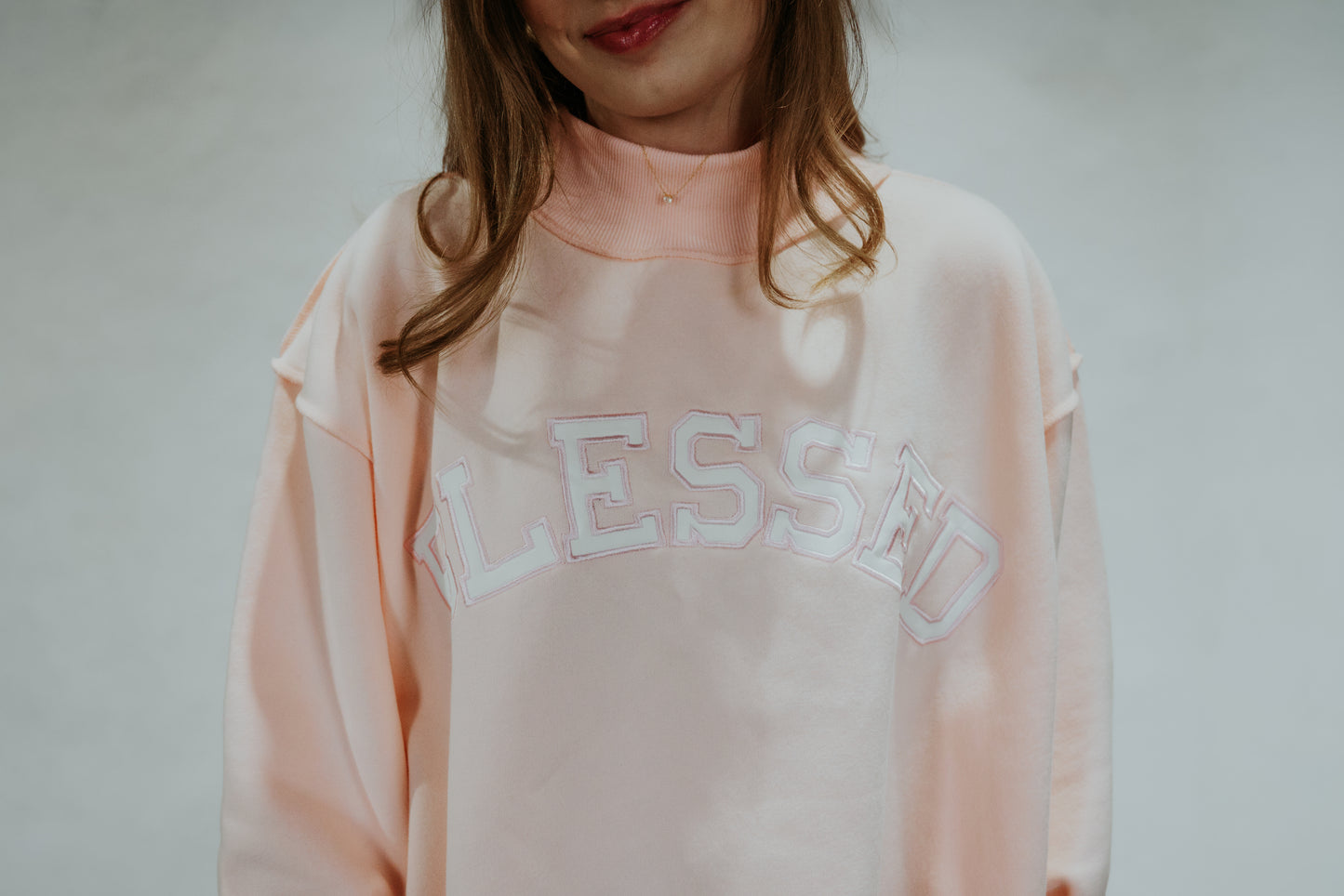 'BLESSED' Embroidered Mockneck Sweatshirt